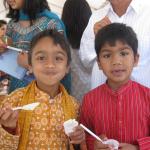 Young vegan ice cream eaters at BAVeg booth at the JCNC 10th Anniversary celebration