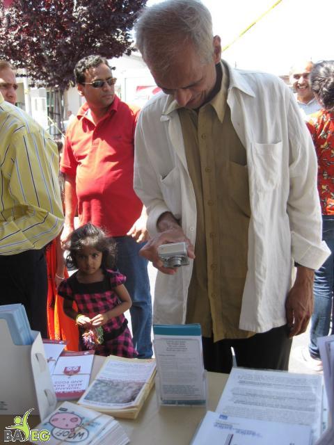 Checking out info at BAVeg booth at the JCNC 10th Anniversary celebration