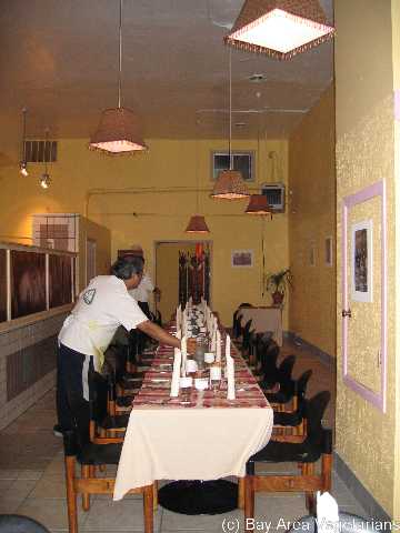 Manish setting the table for us at Kaleva's