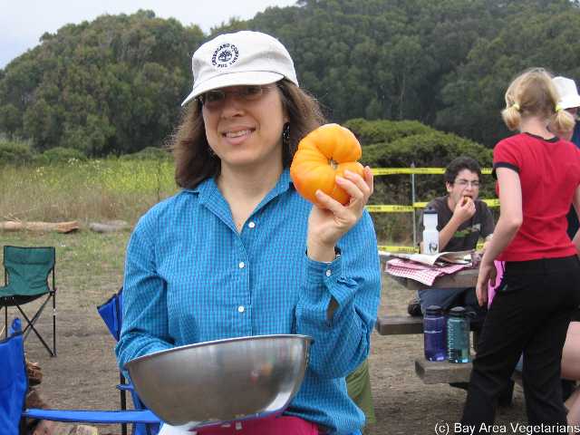 Paula squeezing the tomatoes