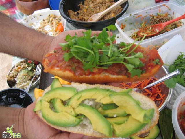 Ravi shows what a completed sandwich looks like