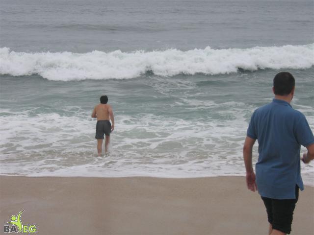 Jon runs into the surf