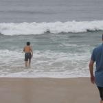 Jon runs into the surf