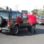 Sharon, handing out a KFC Cruelty leaflet to a passing car